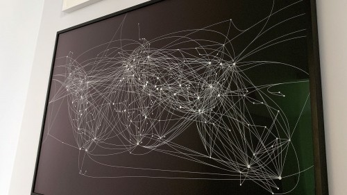 Artwork in 3rd Floor Conference Rooms feature various works of art including Teo González’s Untitled #417 and Ben Langlands and Nikki Belle’s Routes of the World: Day and Night, a duo of screenprints created to visualize global flight patterns.